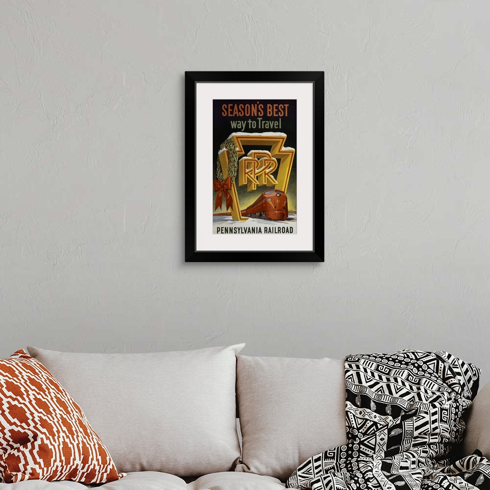 A bohemian room featuring Vintage travel poster of a red train passing through the keystone logo of the Pennsylvania Railro...