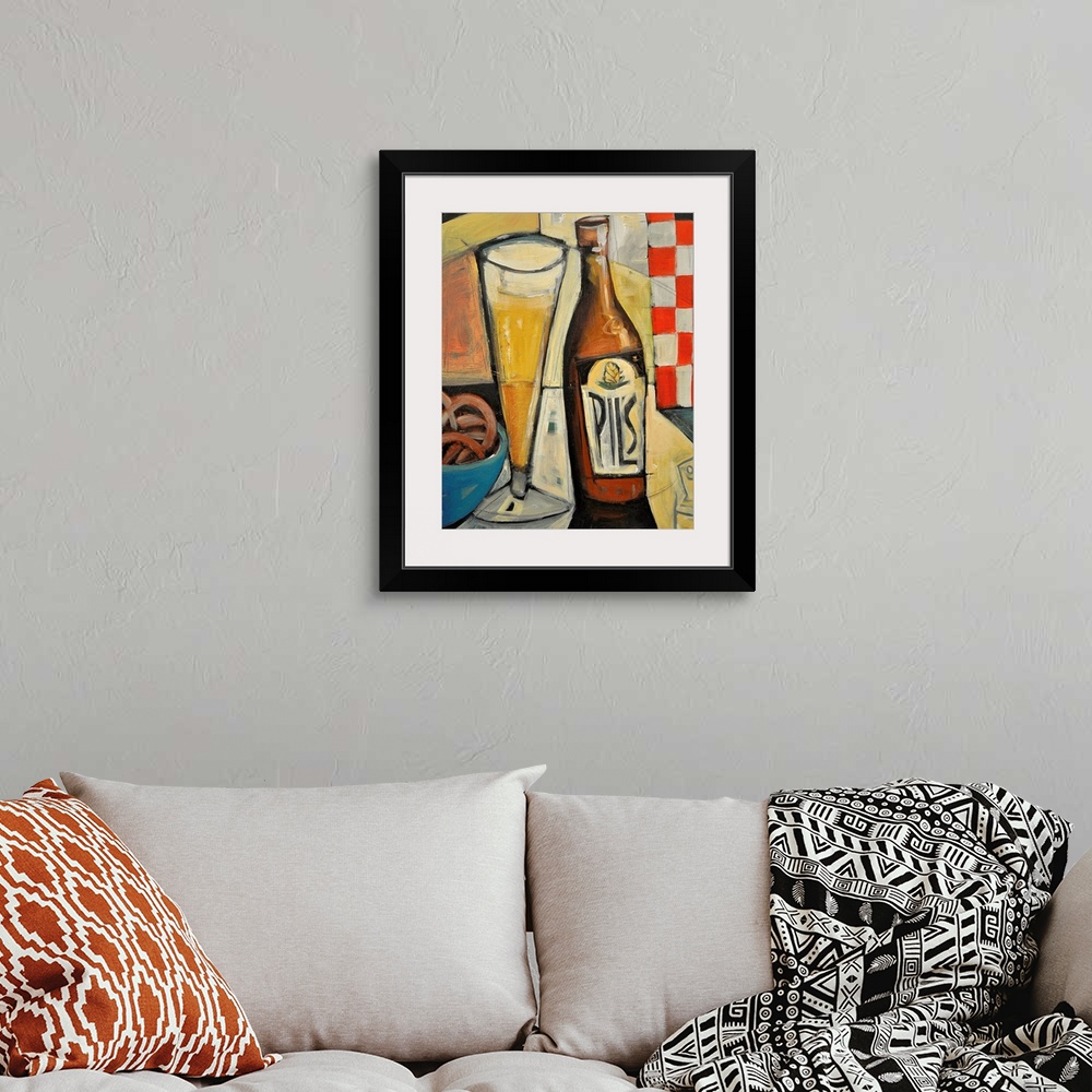 A bohemian room featuring Vertical, large wall painting of a bottle of pilsner sitting next to a tall glass of beer.  The i...
