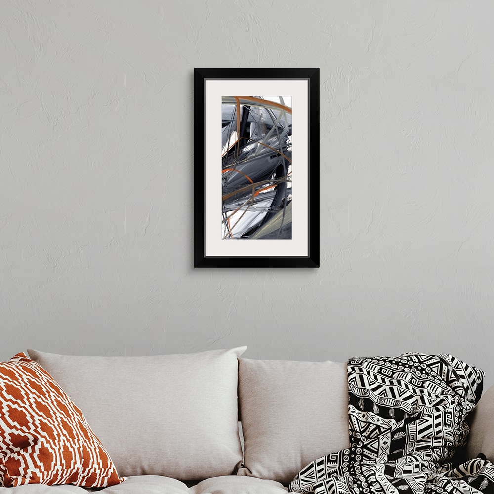 A bohemian room featuring Contemporary abstract artwork of wild strokes of paint in grey and orange.