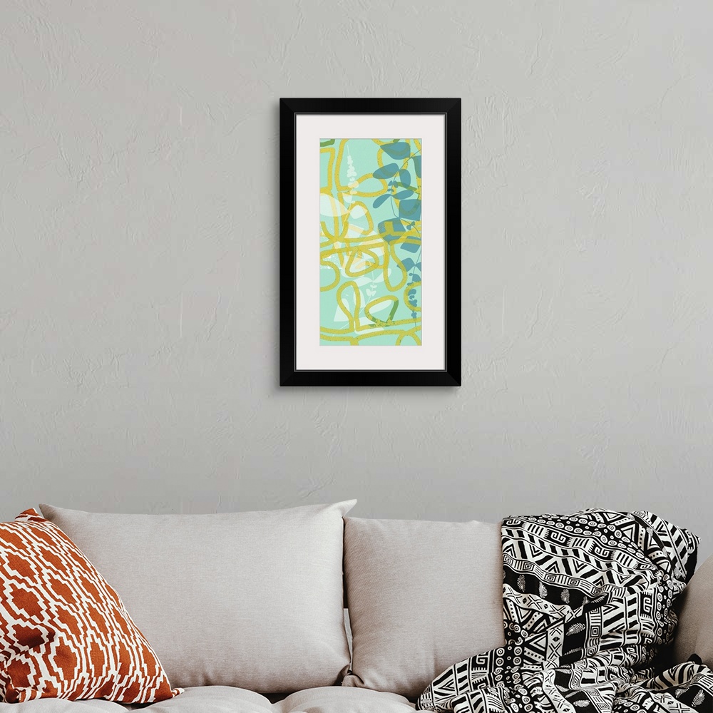 A bohemian room featuring Abstract art piece of bold yellow lines in looping patterns to represent leaves overtop of shadow...