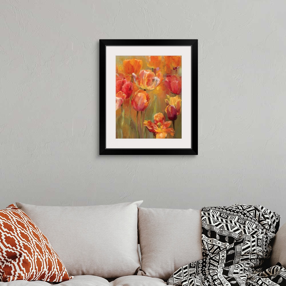 A bohemian room featuring Contemporary painting of several tulip flowers in different shades of orange and pink in warm lig...