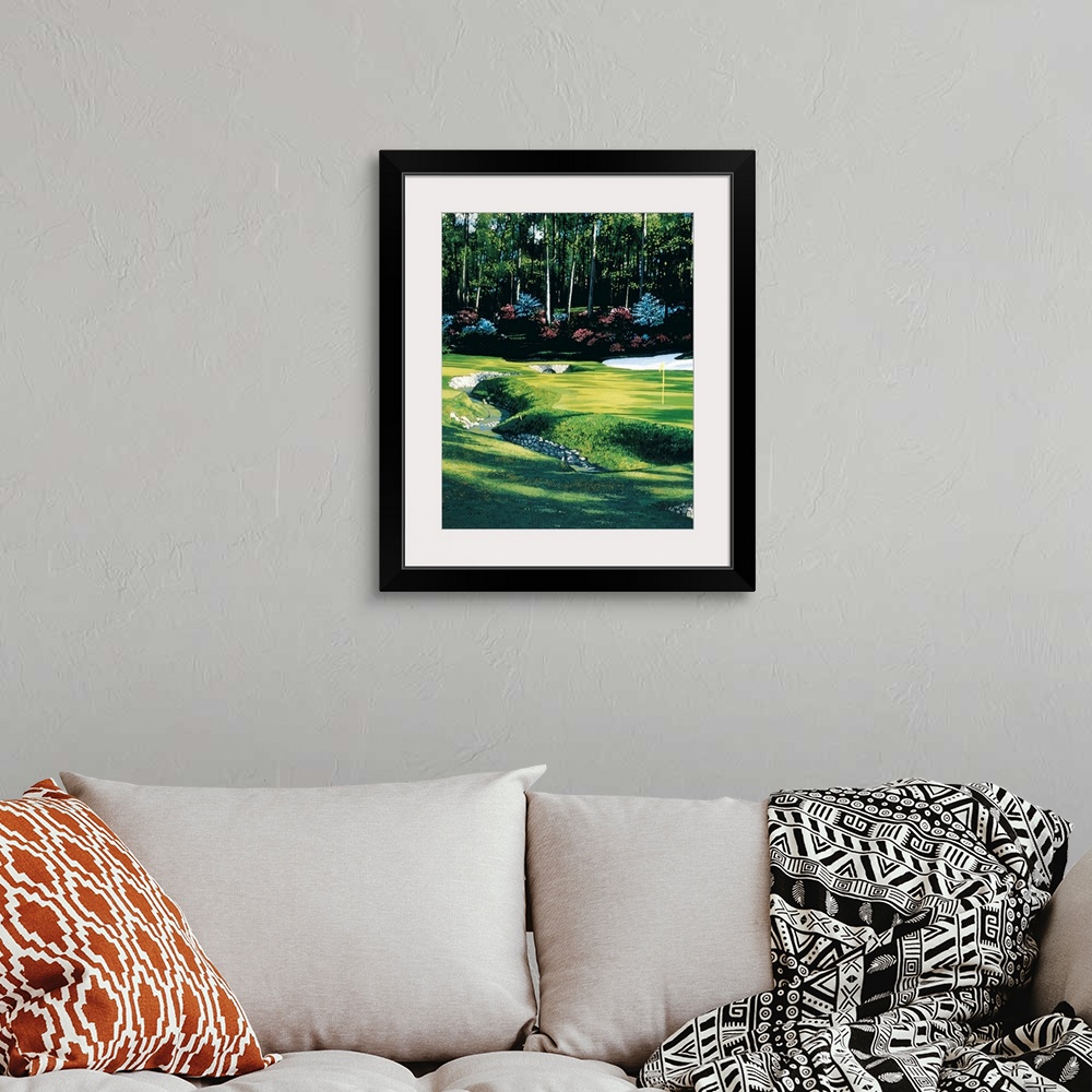 A bohemian room featuring Lifelike painting of stream crossing through a golf course, past the flag towards the forested ed...