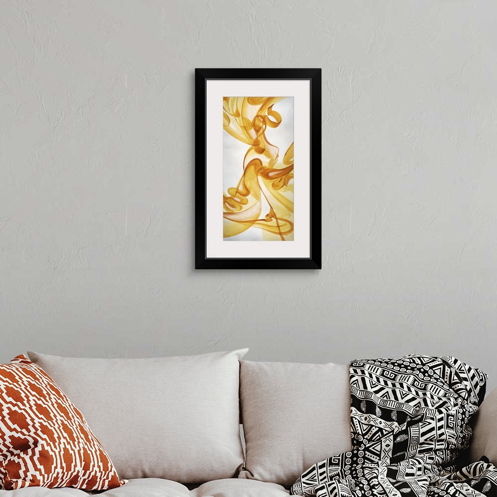 A bohemian room featuring Abstract painting using vibrant yellow tones in swirling motions that look like smoke flowing gen...