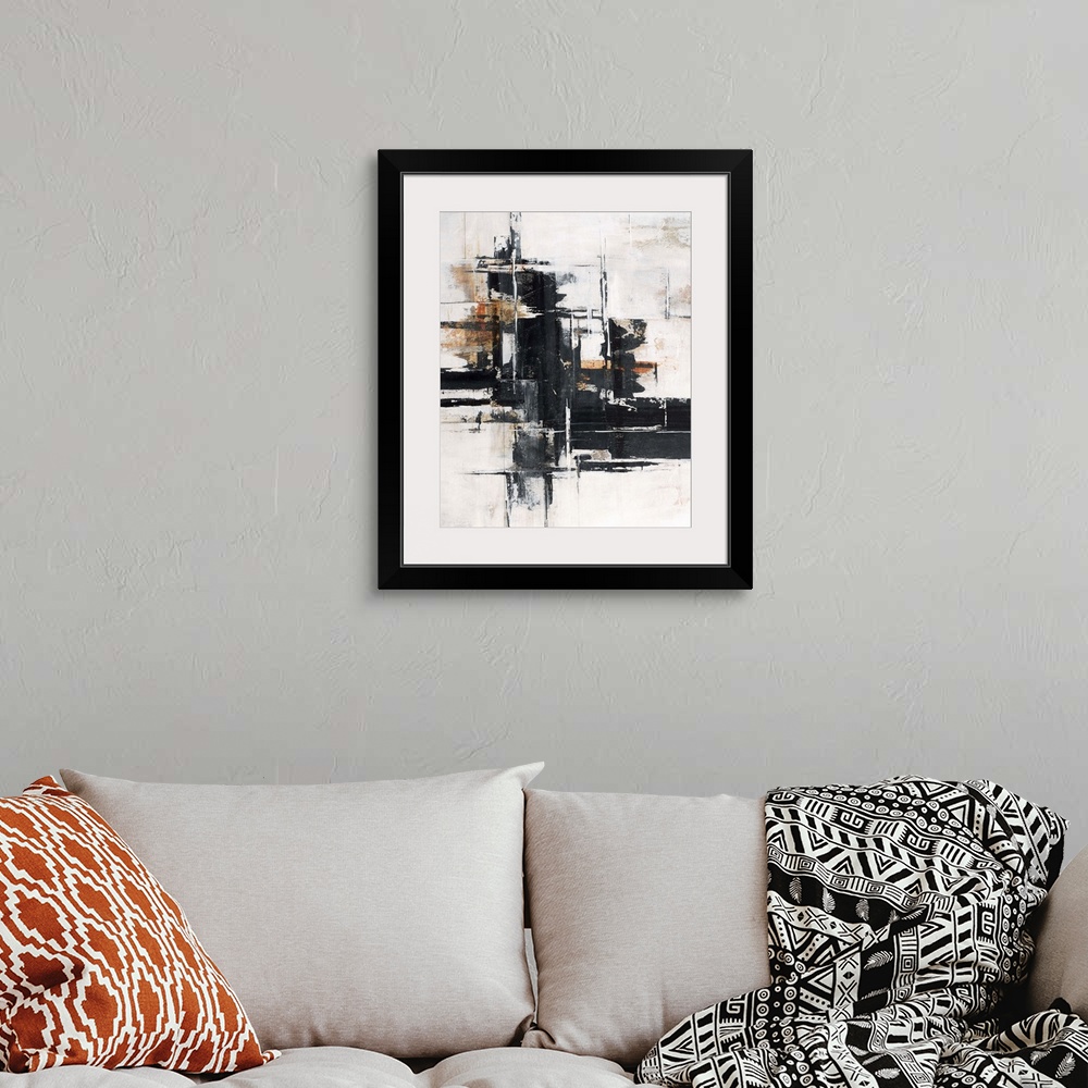 A bohemian room featuring Abstract contemporary painting with black horizontal strokes on white and brown.