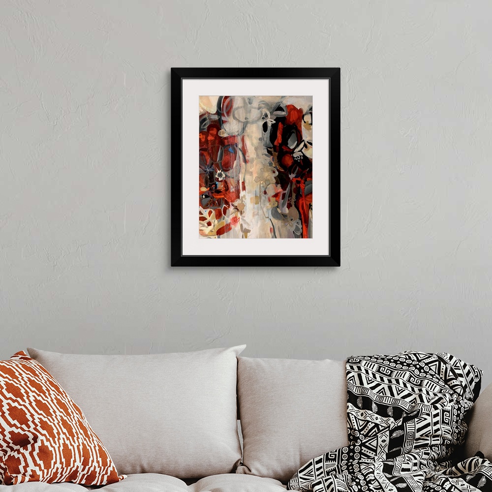A bohemian room featuring Abstractly painted canvas with various curving brush strokes on top of a white patch running up t...