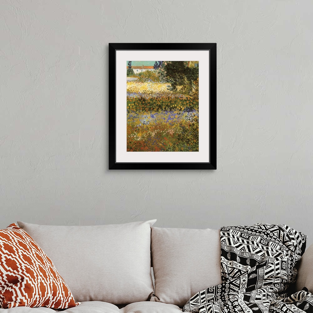 A bohemian room featuring Painting of colorful flower meadow with rooftop in the distance.