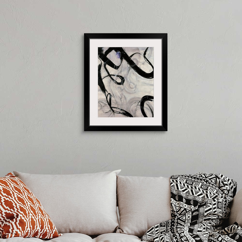 A bohemian room featuring Vertical abstract painting with calligraphic shapes.