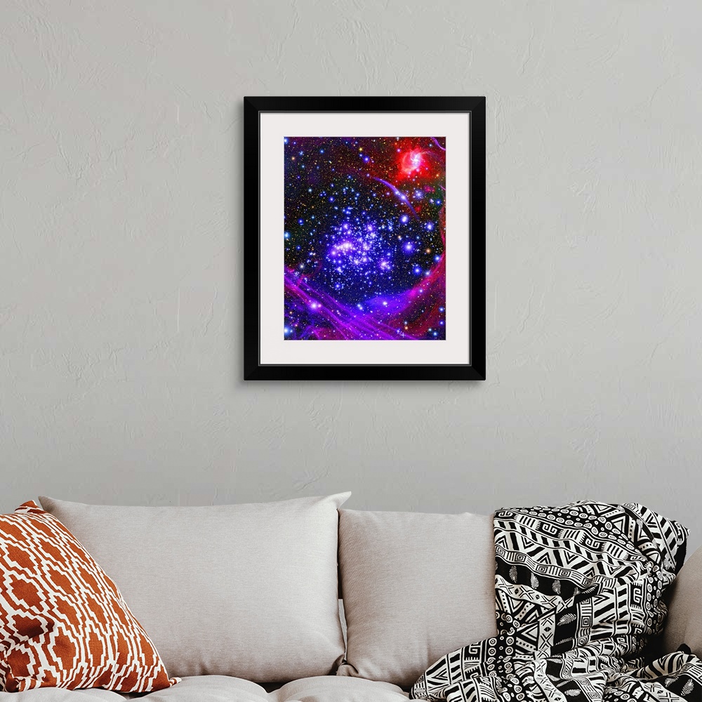A bohemian room featuring Photograph of a starry sky with swirls and bands of color gases.