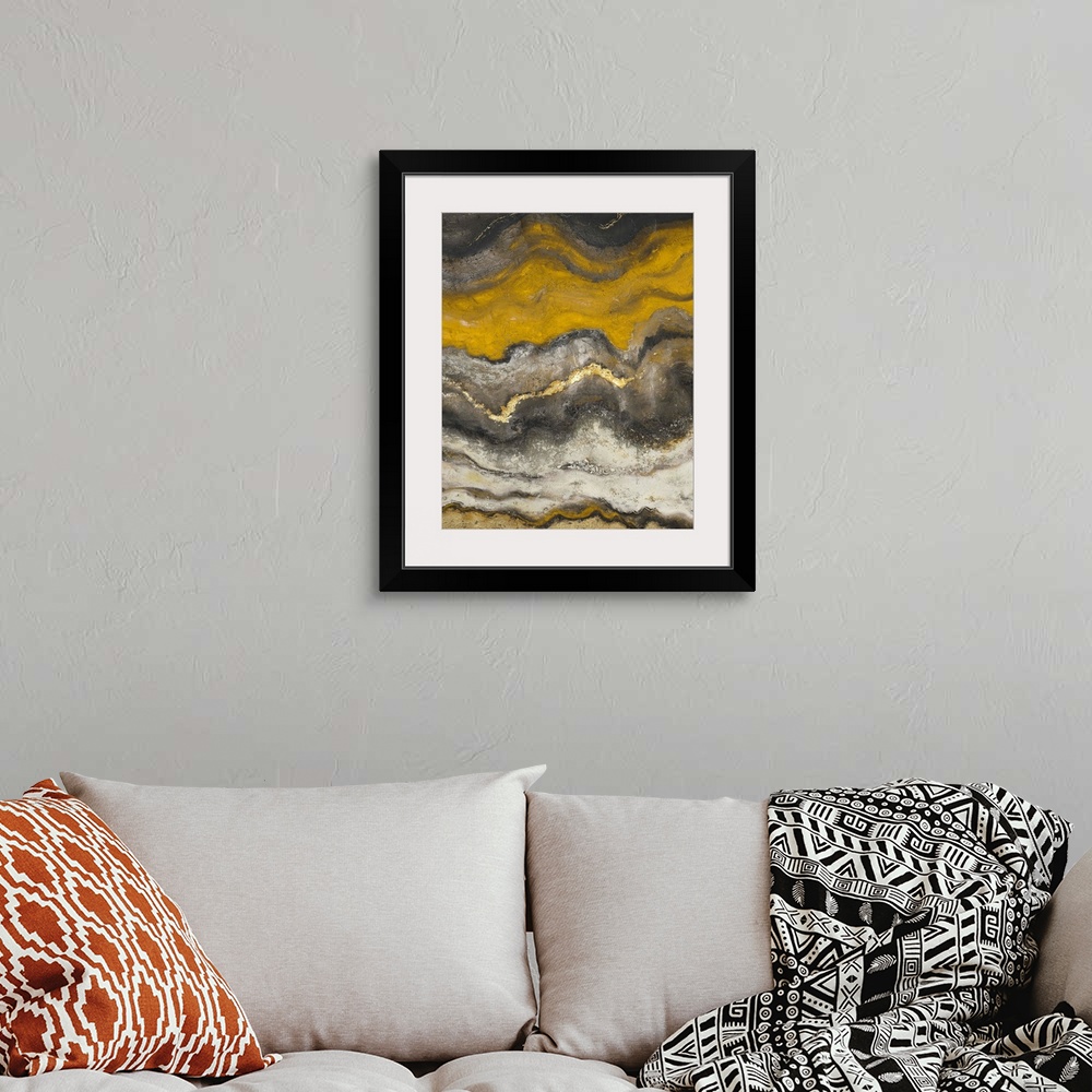 A bohemian room featuring Acrylic painting featuring swirling layers of color reminiscent of flowing magma.