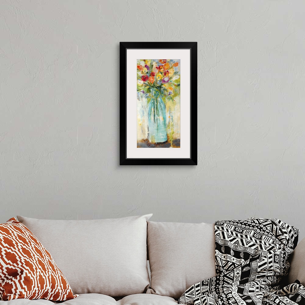 A bohemian room featuring Large panel painting of colorful wildflowers in a glass vase.