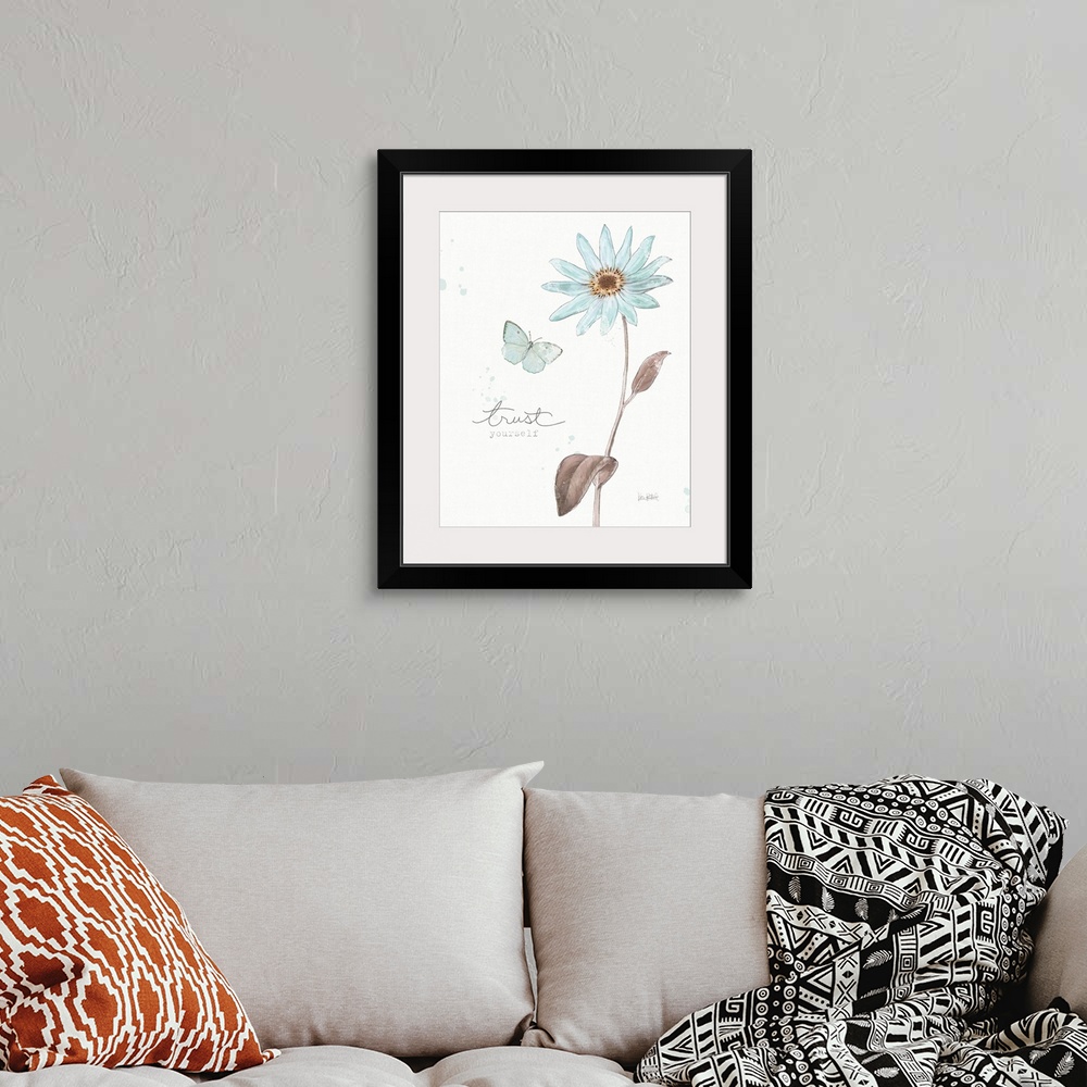 A bohemian room featuring "Trust Yourself" written alongside an illustration of a blue butterfly and a blue flower on a whi...