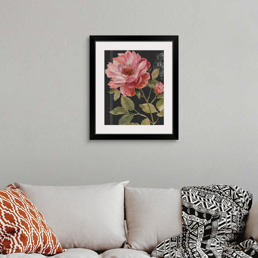 A bohemian room featuring Large painted pink rose on a black background with a white design.