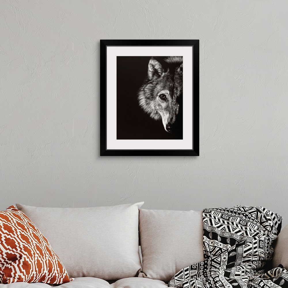 A bohemian room featuring Black and white lifelike illustration of a wolf.