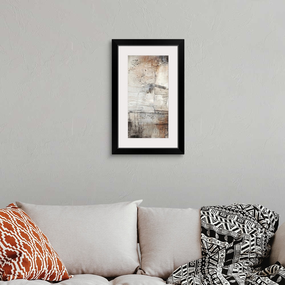 A bohemian room featuring This industrial abstract artwork features textural designs in earthy and rustic tones over a chal...