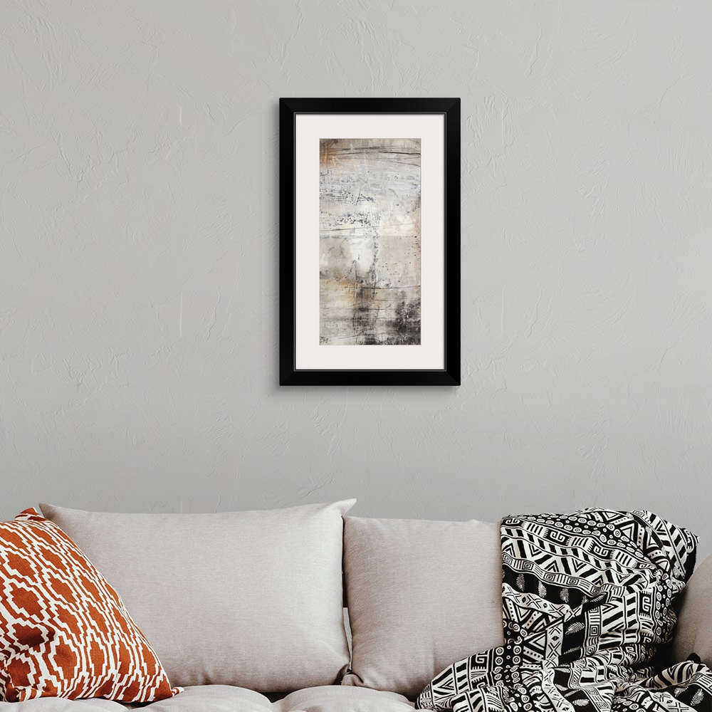 A bohemian room featuring This industrial abstract artwork features textural designs in earthy and rustic tones over a chal...