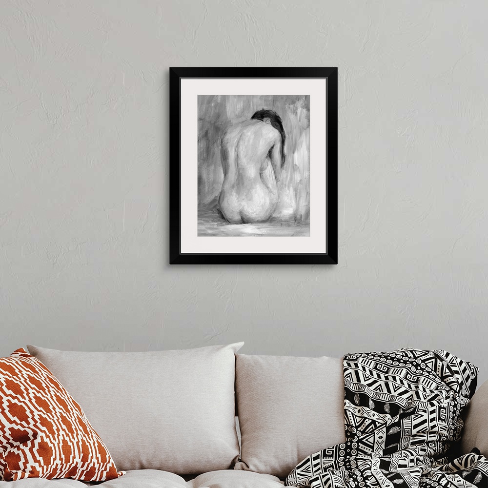 A bohemian room featuring Portrait, large figurative painting of the back of a nude woman sitting on the floor, her head ha...