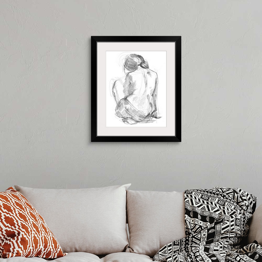 A bohemian room featuring Drawing of the back of a nude woman looking downwards on a white background.