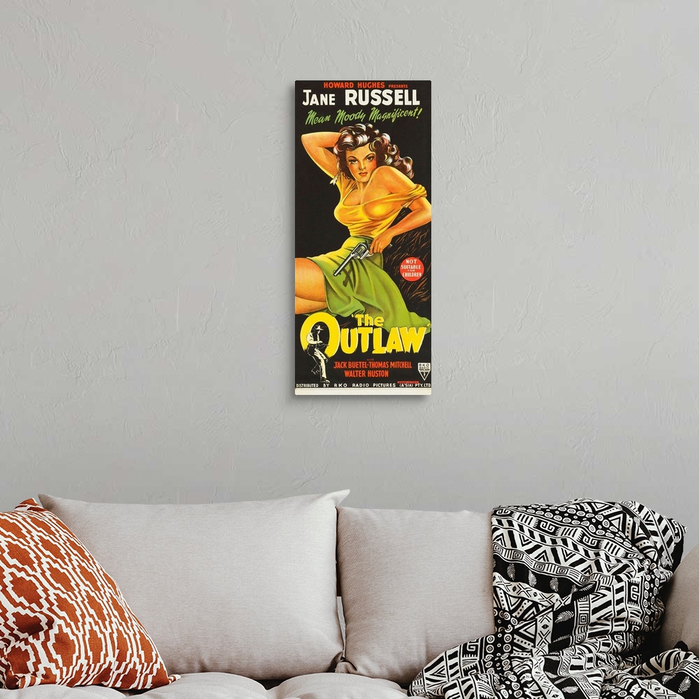 A bohemian room featuring The Outlaw - Vintage Movie Poster