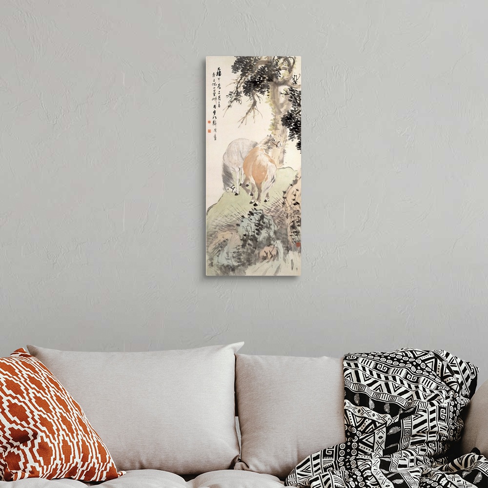 A bohemian room featuring Woodblock print of two horses on a rocky cliff under a tree.