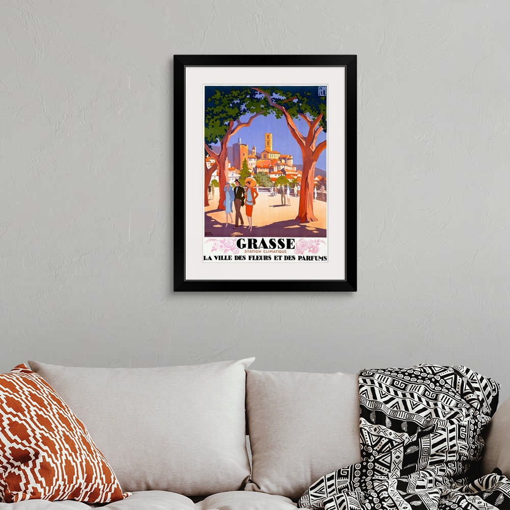 A bohemian room featuring Old print advertising vacation travel.  A colorful image of a city is seen from between two huge ...