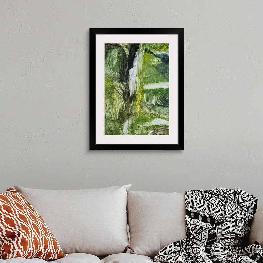 A bohemian room featuring Painting on paper of a cascading waterfall in the forest.