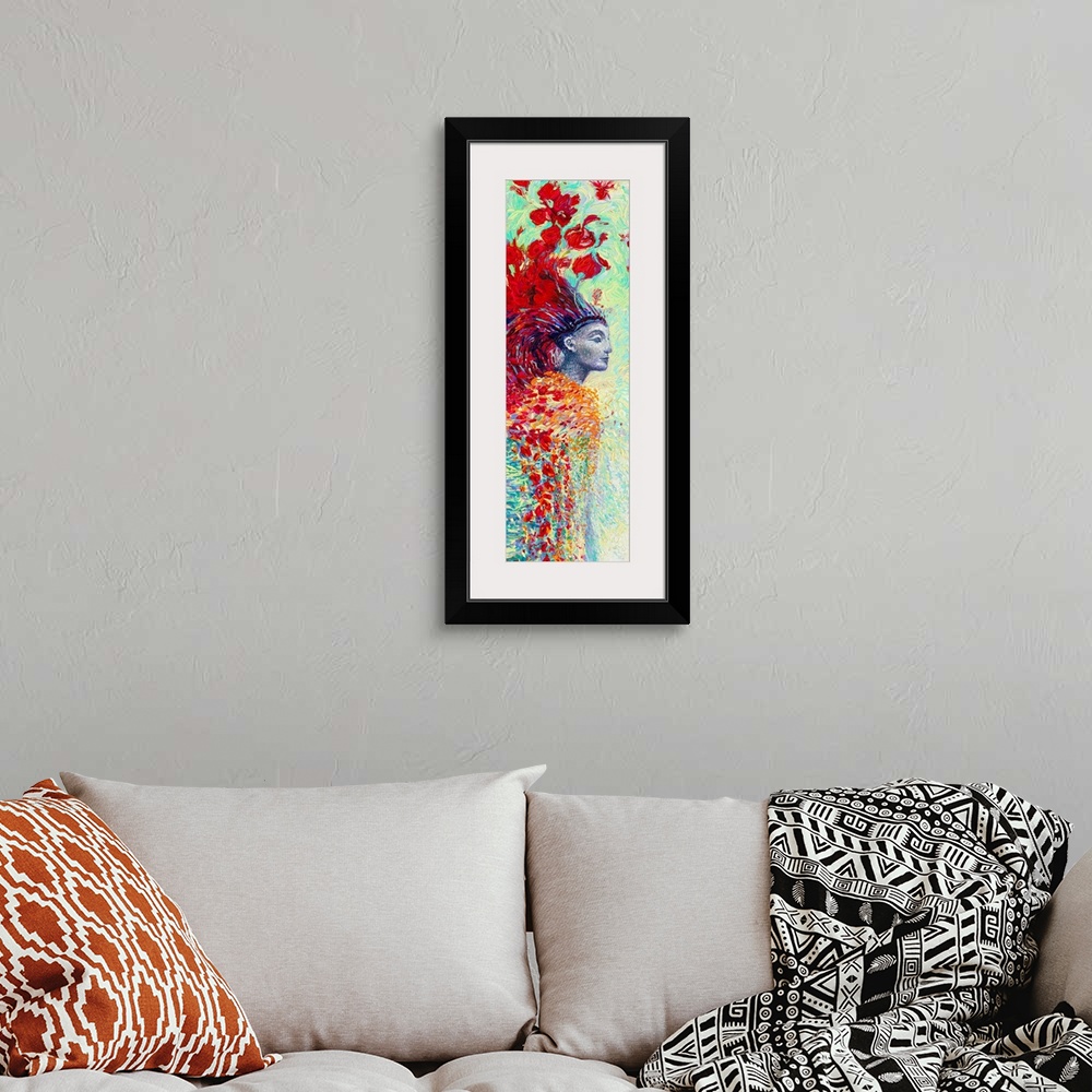 A bohemian room featuring Brightly colored contemporary artwork of a statue with red flowers and feathers.