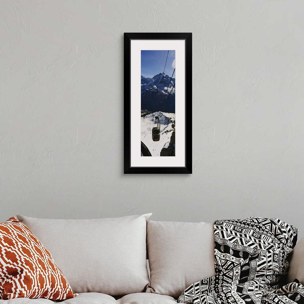 A bohemian room featuring High angle view of an overhead cable car, Jungfrau, Bernese Oberland, Swiss Alps, Switzerland
