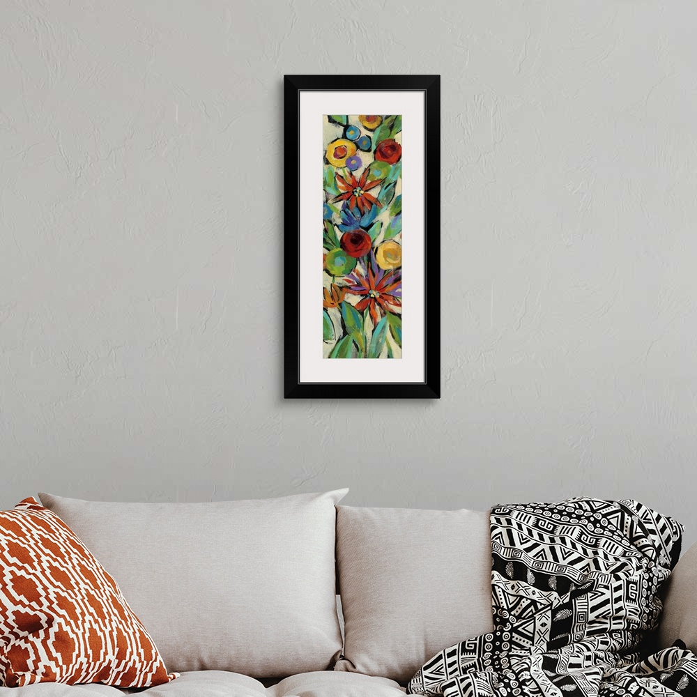A bohemian room featuring Tall, rectangular painting of colorful wildflowers filling up the entire canvas on a neutral colo...