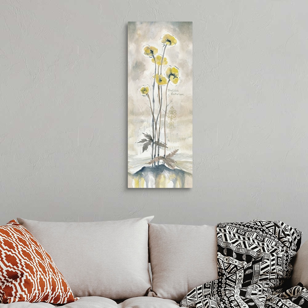 A bohemian room featuring Tall watercolor painting of long stemmed yellow flowers on a neutral colored background.