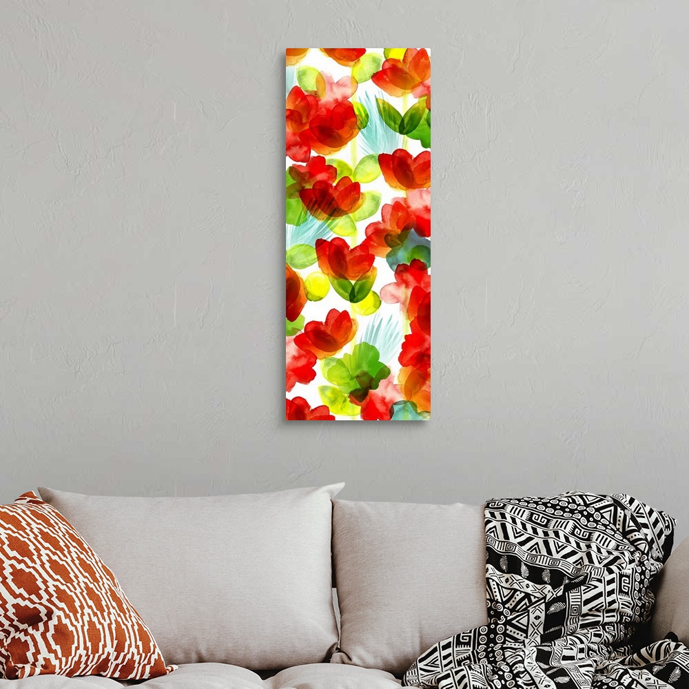 A bohemian room featuring A large vertical watercolor painting of bright colored flowers of red, yellow and green on a whit...