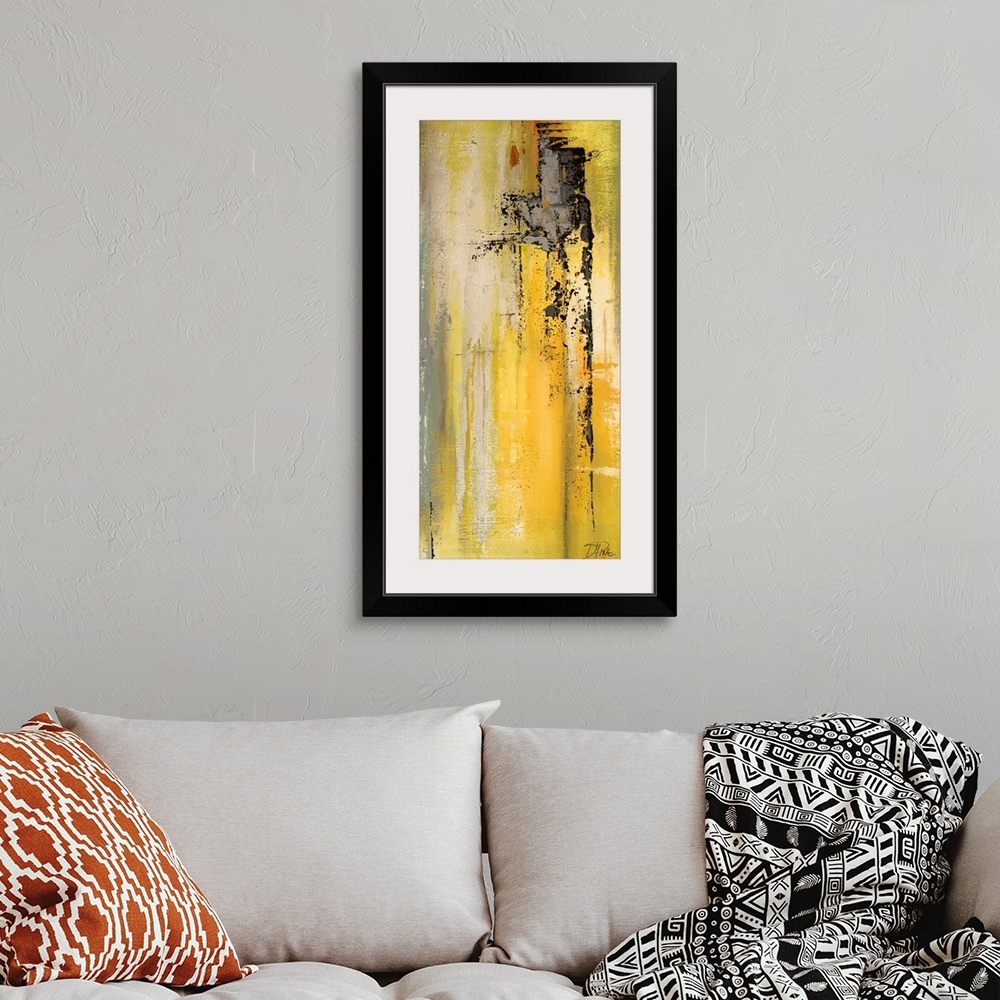 A bohemian room featuring Contemporary abstract painting using yellow tones mixed with gray in vertical streaking motions.