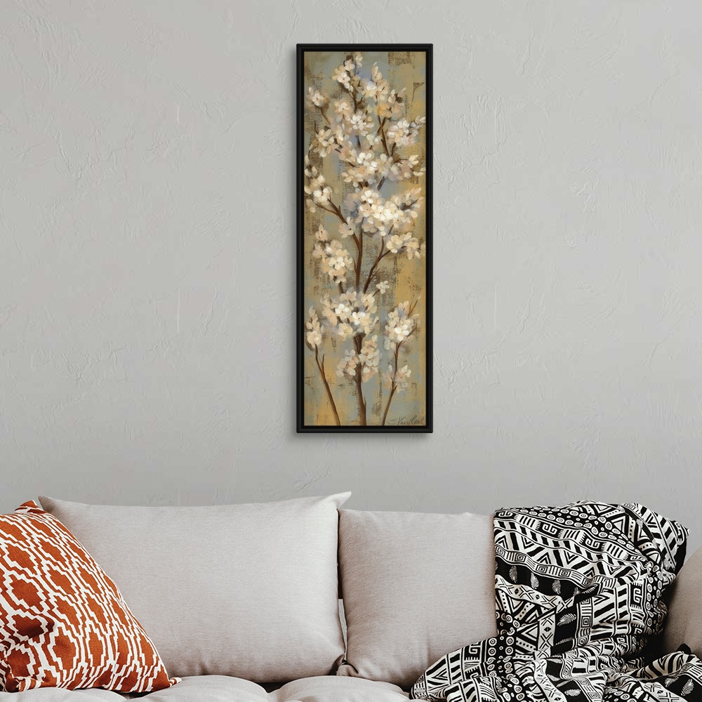 A bohemian room featuring Vertical panoramic painting of long vertical branches covered in small flowers.