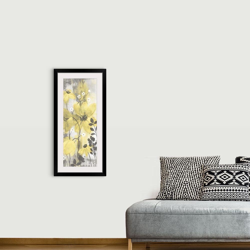A bohemian room featuring Contemporary artwork of yellow flowers over a distressed gray background.