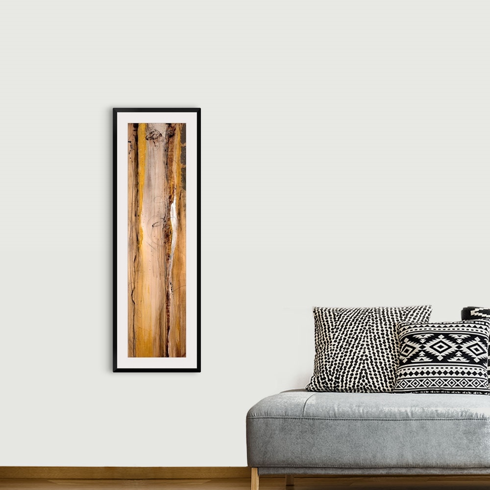 A bohemian room featuring Vertical long canvas painting with abstract lines and wood grain texture.