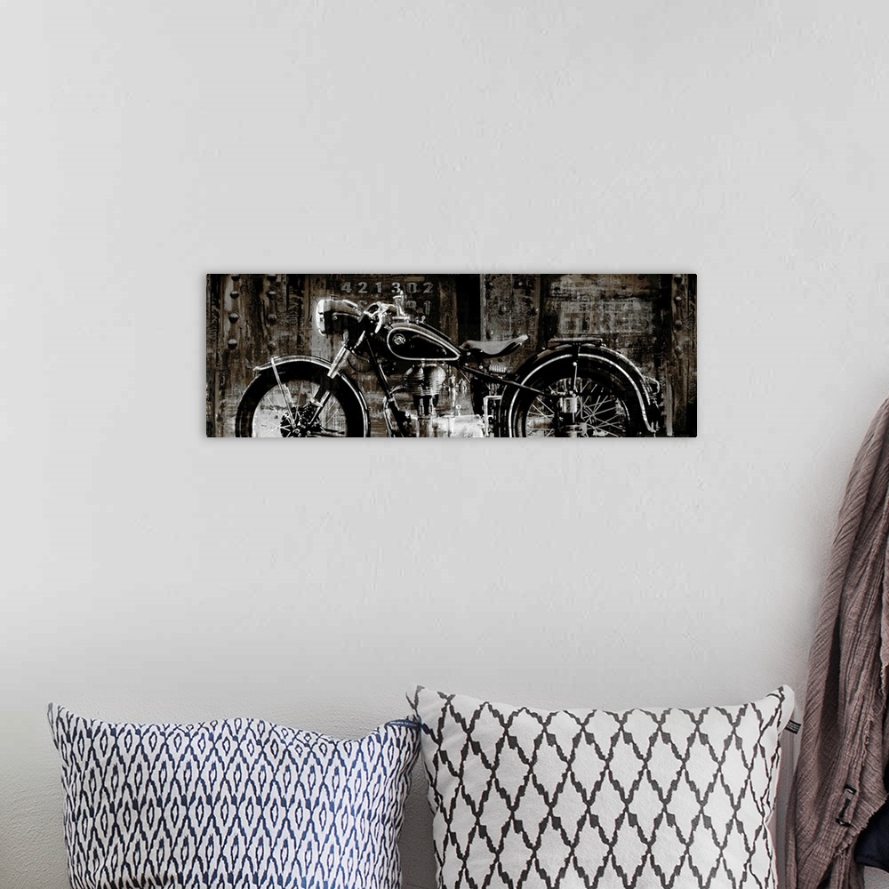 A bohemian room featuring Panoramic decor with an illustration of a motorcycle on an industrial style background.