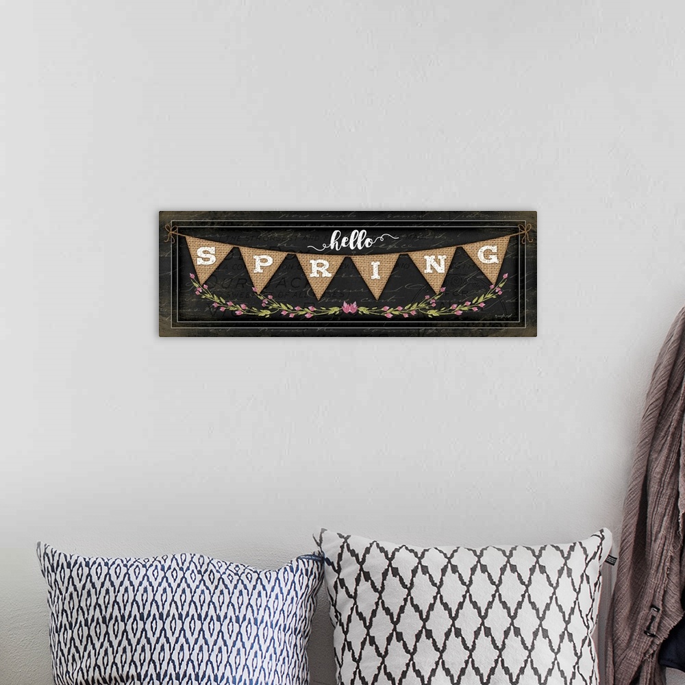 A bohemian room featuring "Hello Spring" on a bunting banner with flowers.