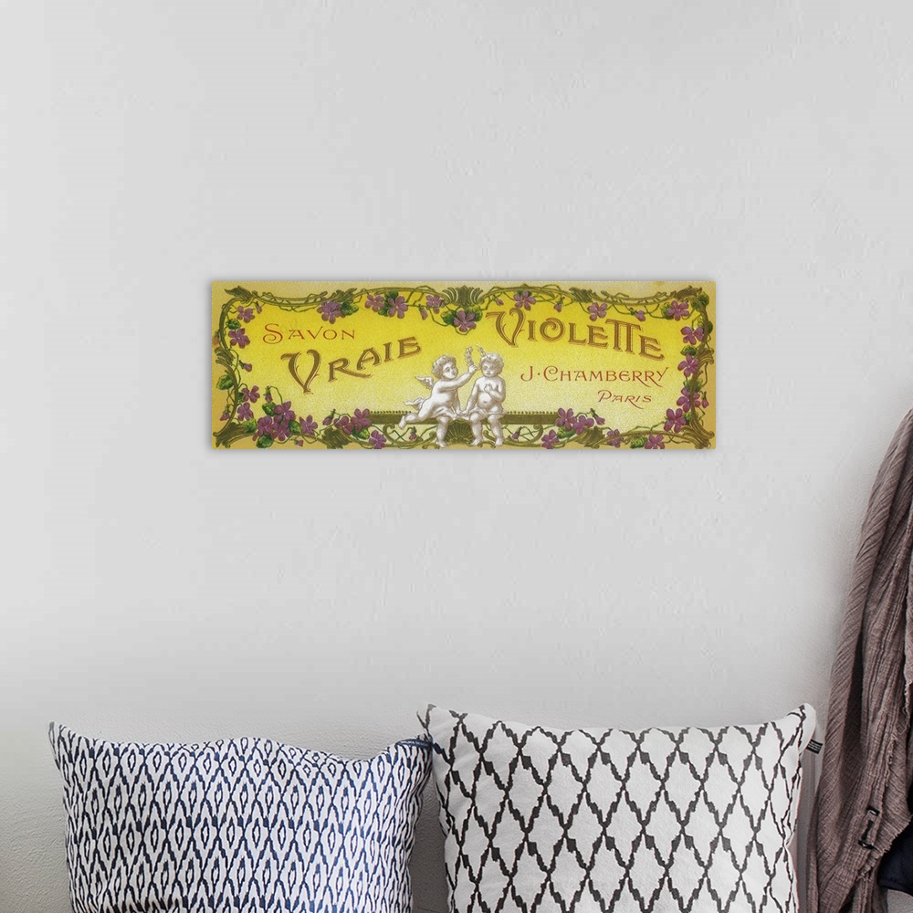 A bohemian room featuring French soap label, Real Violets brand.