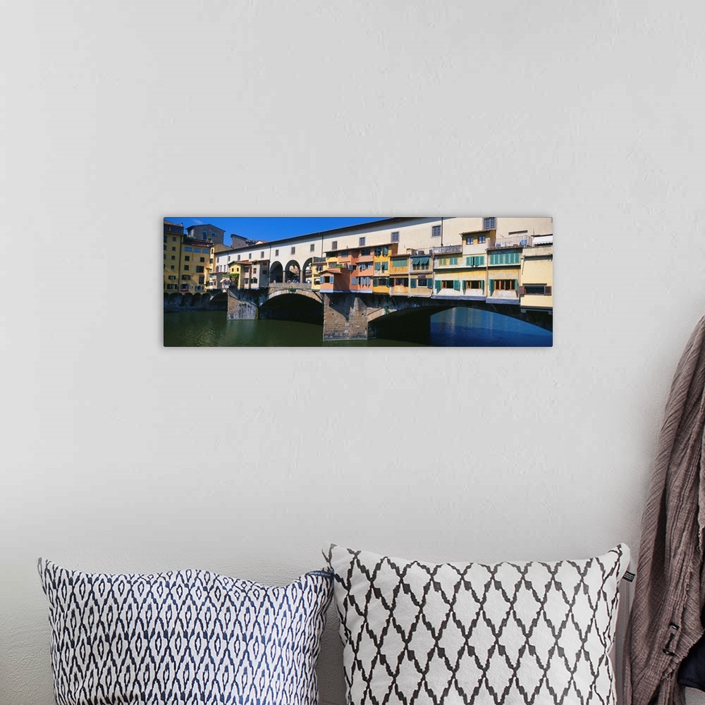 A bohemian room featuring Bridge across a river, Ponte Vecchio, River Arno, Florence, Tuscany, Italy