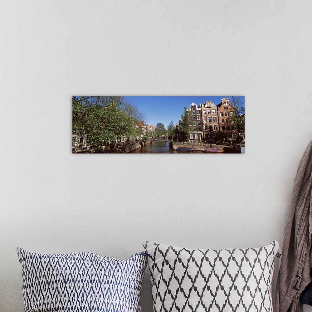 A bohemian room featuring Buildings in a city, Amsterdam, North Holland, Netherlands