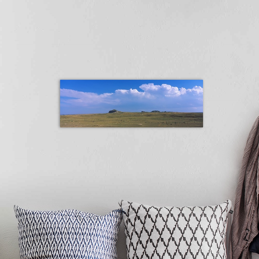 A bohemian room featuring Clouds over a landscape, Castle Rock, Scotts Bluff County, Nebraska,