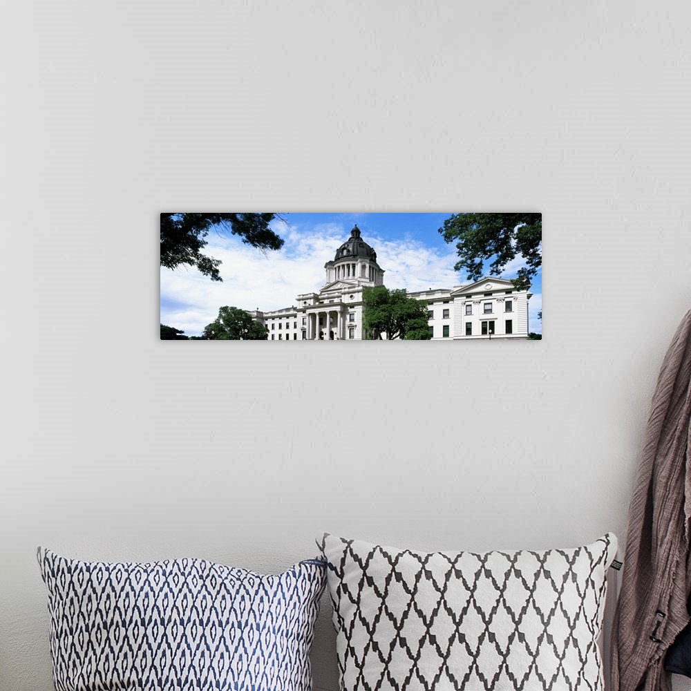A bohemian room featuring Low angle view of a government building, South Dakota State Capitol, Pierre, South Dakota, USA.