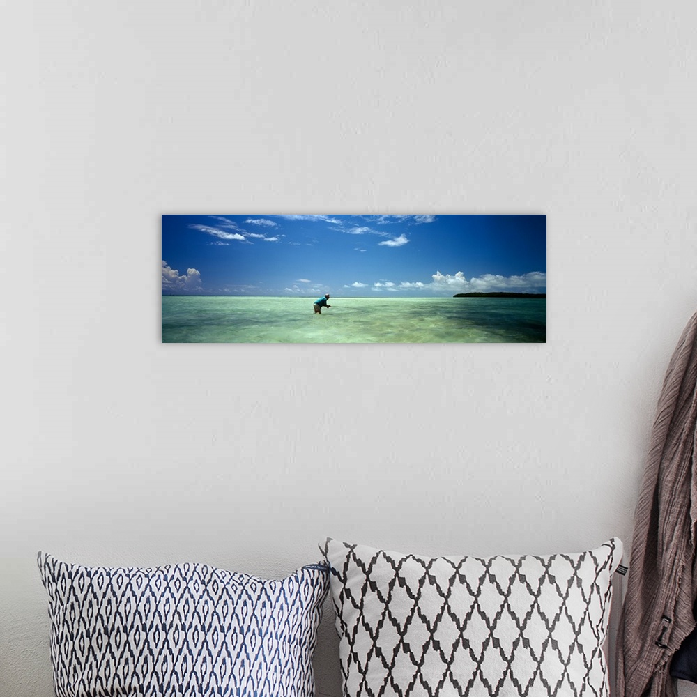 A bohemian room featuring Person fishing on the beach, Islamorada, Florida Keys, Monroe County, Florida, USA