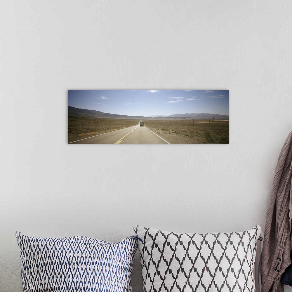 A bohemian room featuring Road passing through a landscape, Death Valley National Park, California