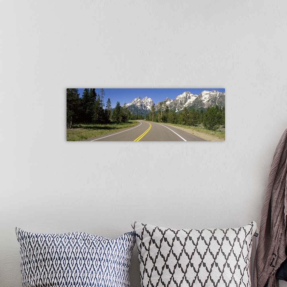 A bohemian room featuring Road w/ Teton Range in distance Grand Teton National Park WY