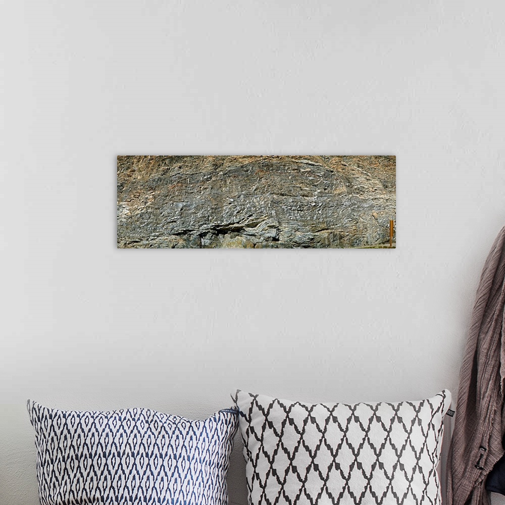 A bohemian room featuring Rock wall from road cut, Icefields Parkway, Alberta, Canada