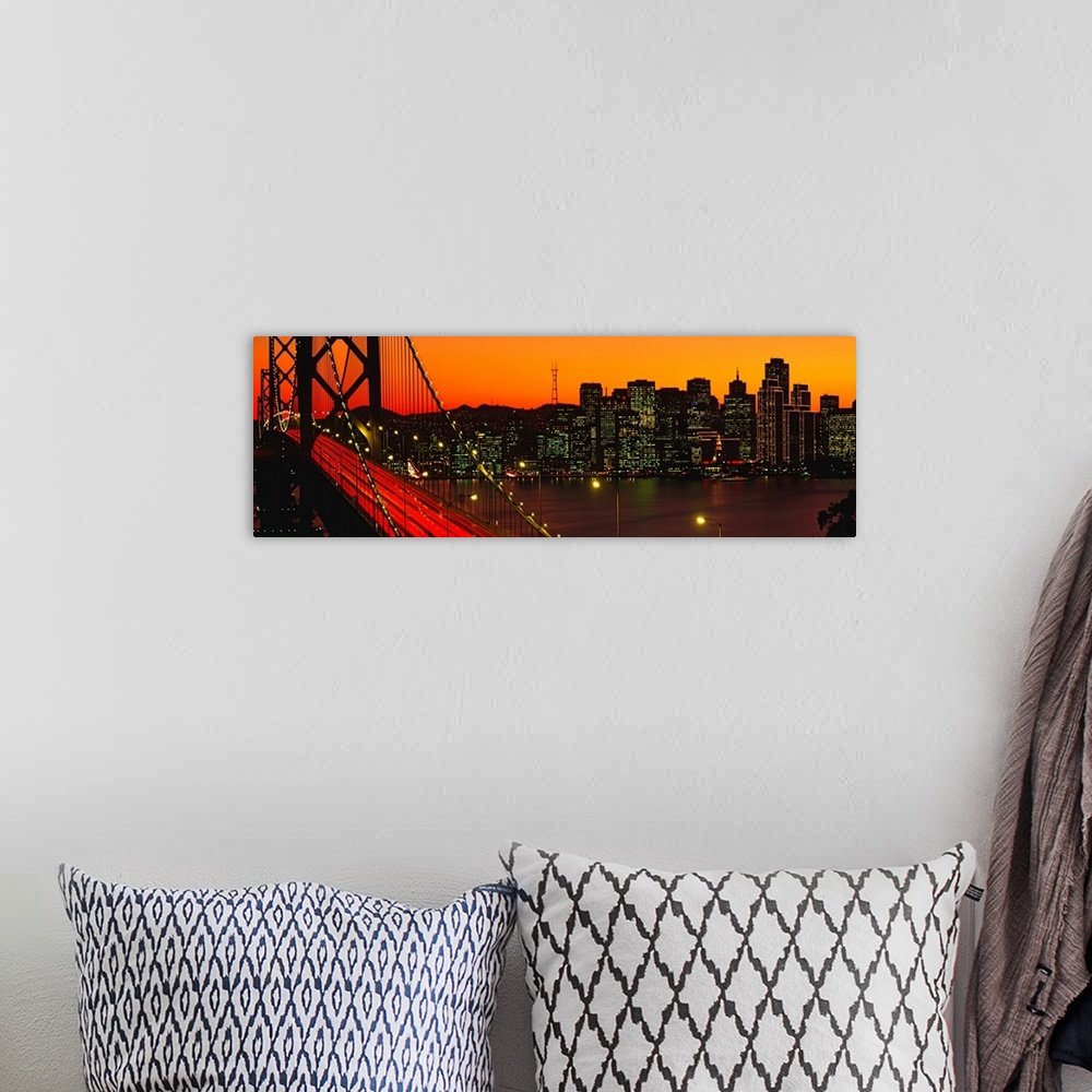 A bohemian room featuring Panoramic photograph shows a large overpass near the coast of the Western United States brightly ...