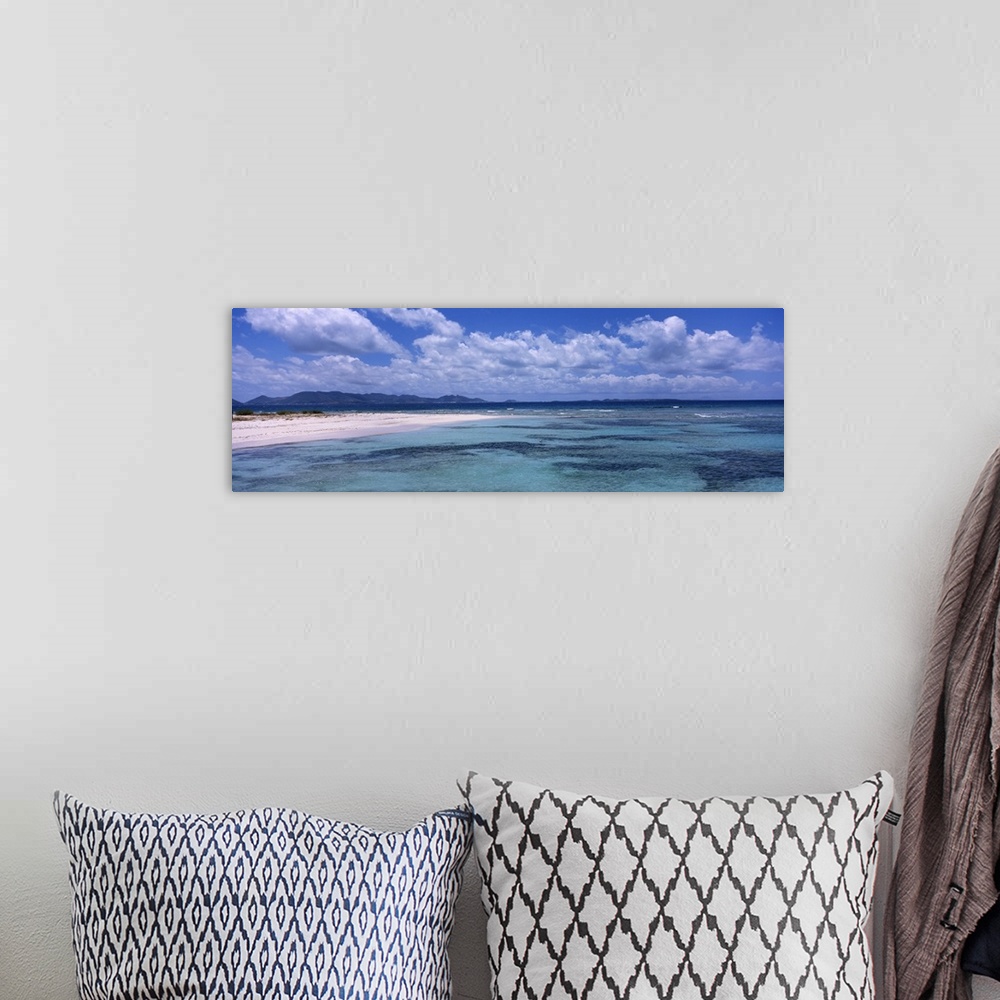 A bohemian room featuring Sea with a mountain range in the background, Cove Bay, Anguilla