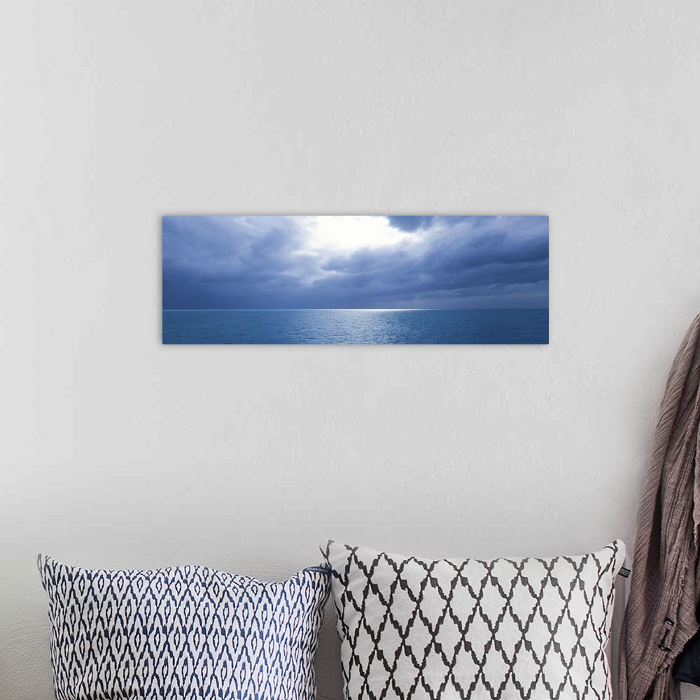 A bohemian room featuring Storm Clouds over the sea