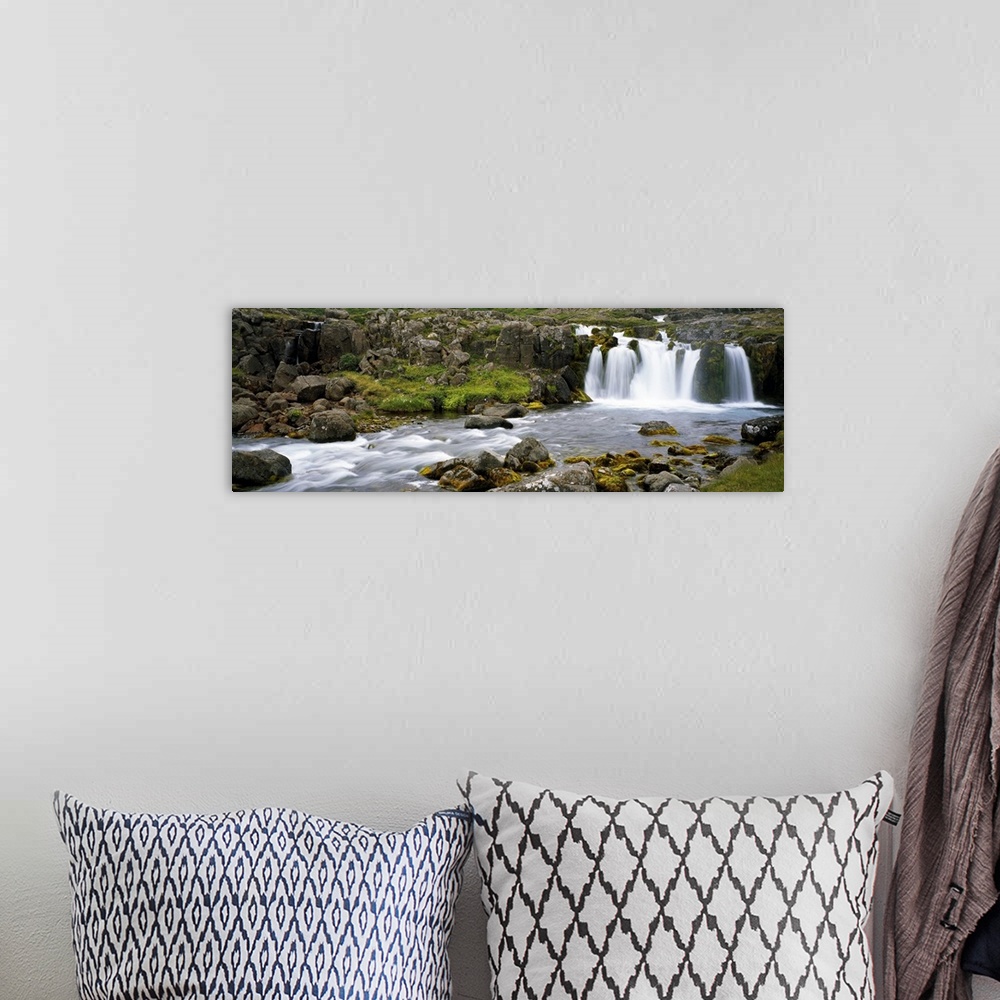A bohemian room featuring Waterfall on rocky stream, Iceland