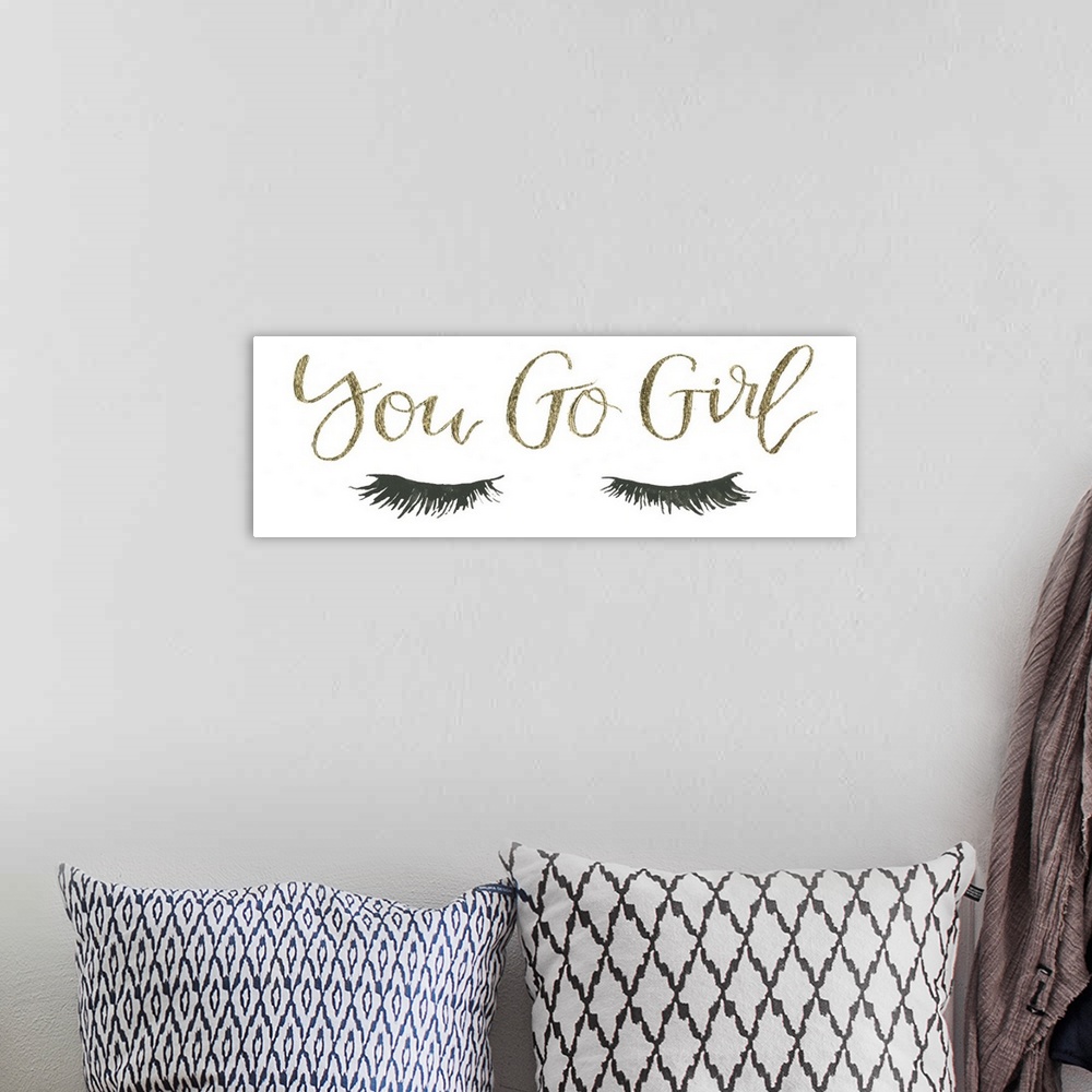 A bohemian room featuring 'You Go Girl'